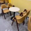 Ghế gỗ cafe chân chữ A mặt nệm bọc da mới 99%