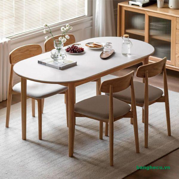 Bộ bàn ăn 4 ghế gỗ PLC mặt nệm sang trọng mới 90%